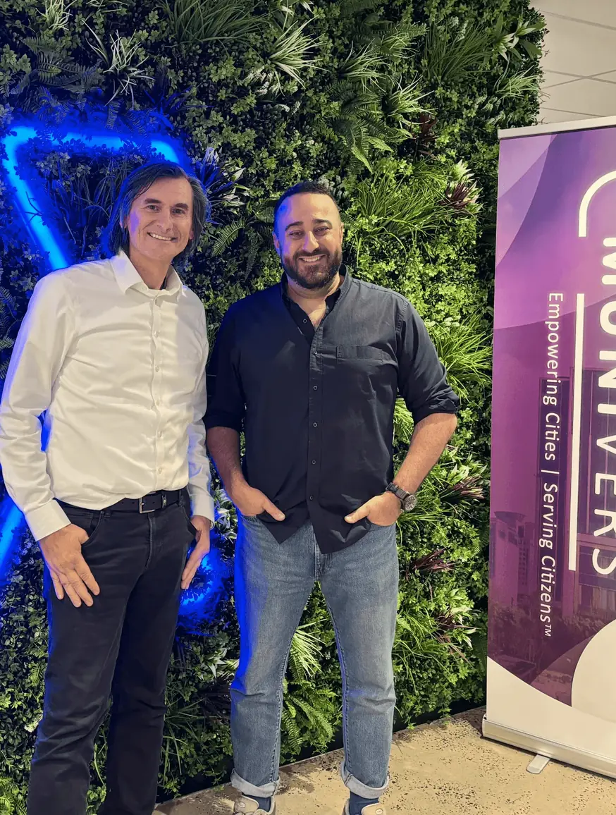 Sam Halcrow with a colleague at an Agilyx event